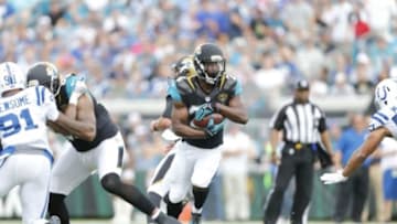 Dec 13, 2015; Jacksonville, FL, USA; Jacksonville Jaguars running back T.J. Yeldon (24) runs the ball against the Indianapolis Colts in the first quarter at EverBank Field. Mandatory Credit: Jim Steve-USA TODAY Sports