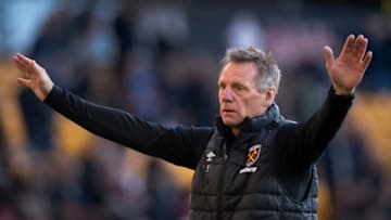 WOLVERHAMPTON, ENGLAND - NOVEMBER 20: First team coach Stuart Pearce helps warm the players up before the Premier League match between Wolverhampton Wanderers and West Ham United at Molineux on November 20, 2021 in Wolverhampton, England. (Photo by Visionhaus/Getty Images)