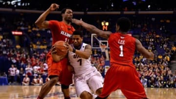 Mar 8, 2015; St. Louis, MO, USA; Northern Iowa Panthers guard Deon Mitchell (1) drives to the basket between Illinois State Redbirds forward MiKyle McIntosh (11) and guard Paris Lee (1) during second half in the championship game of the Missouri Valley Conference basketball tournament at Scotttrade Center. Northern Iowa Panthers won 60-69. Mandatory Credit: Jasen Vinlove-USA TODAY Sports