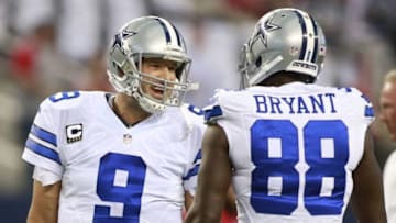 Sep 7, 2014; Arlington, TX, USA; Dallas Cowboys quarterback Tony Romo (9) talks with wide receiver Dez Bryant (88) before the game against the San Francisco 49ers at AT&T Stadium. Mandatory Credit: Tim Heitman-USA TODAY Sports