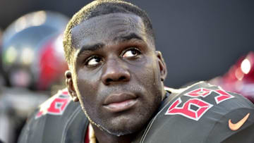 Dec 14, 2014; Charlotte, NC, USA; Tampa Bay Buccaneers tackle Demar Dotson (69) on the sidelines in the fourth quarter. The Panthers defeated the Buccaneers 19-17 at Bank of America Stadium. Mandatory Credit: Bob Donnan-USA TODAY Sports