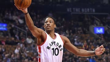 Oct 31, 2016; Toronto, Ontario, CAN; Toronto Raptors guard DeMar DeRozan (10) goes up for a rebound against the Denver Nuggets in the first half at Air Canada Centre. Mandatory Credit: Dan Hamilton-USA TODAY Sports