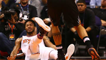 Dec 13, 2016; Phoenix, AZ, USA; New York Knicks guard Derrick Rose (25) reacts as he lands on his back against the Phoenix Suns in the first quarter at Talking Stick Resort Arena. The Suns defeated the Knicks 113-111 in overtime. Mandatory Credit: Mark J. Rebilas-USA TODAY Sports