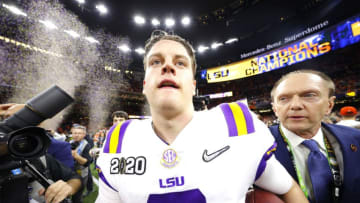 NEW ORLEANS, LOUISIANA - JANUARY 13: Joe Burrow #9 of the LSU Tigers celebrates after defeating the Clemson Tigers 42-25 in the College Football Playoff National Championship game at Mercedes Benz Superdome on January 13, 2020 in New Orleans, Louisiana. (Photo by Kevin C. Cox/Getty Images)