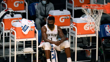 LOS ANGELES, CALIFORNIA - JANUARY 15: Zion Williamson #1 of the New Orleans Pelicans watches from the bench during a 112-95 Los Angeles Lakers win at Staples Center on January 15, 2021 in Los Angeles, California. (Photo by Harry How/Getty Images)