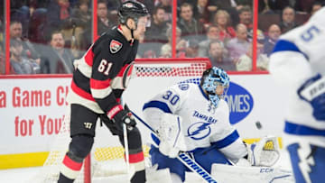 Mar 3, 2016; Ottawa, Ontario, CAN; Tampa Bay Lightning goalie Ben Bishop (30) makes a save in front of Ottawa Senators right wing Mark Stone (61) in the second period at the Canadian Tire Centre. Mandatory Credit: Marc DesRosiers-USA TODAY Sports