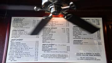 DENVER, CO - JANUARY 17: One of the big menus hung up on the wall through out the bar at My Brother's Bar. The Karagas family sold the bar to long-time waitress Paula Newman. Patrons gather for the lunch hour January 17, 2017. Owner Paula and her son Danny said they will still play the classical music and keep the same menu, nothing will change. (Photo By John Leyba/The Denver Post via Getty Images)