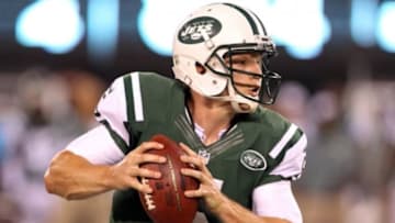 Aug 7, 2014; East Rutherford, NJ, USA; New York Jets quarterback Matt Simms (5) scrambles against the Indianapolis Colts during the second half at MetLife Stadium. The Jets defeated the Colts 13-10. Mandatory Credit: Adam Hunger-USA TODAY Sports