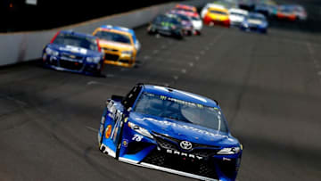 INDIANAPOLIS, IN - JULY 23: Martin Truex Jr., driver of the #78 Auto-Owners Insurance Toyota, leads a pack of cars during the Monster Energy NASCAR Cup Series Brickyard 400 at Indianapolis Motorspeedway on July 23, 2017 in Indianapolis, Indiana. (Photo by Sean Gardner/Getty Images)