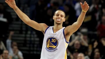 Jan 23, 2015; Oakland, CA, USA; Golden State Warriors guard Stephen Curry (30) celebrates Clay Thompson (11) (not pictured) 48th point against the Sacramento Kings in the second half of their NBA basketball game at Oracle Arena. Mandatory Credit: Lance Iversen-USA TODAY Sports. Thompson set a record 52 points in their win over the kings.