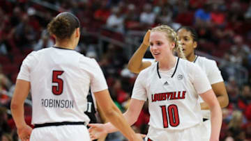 U of L’s Hailey Van Lith (10) and Mykasa Robinson (5) celebrated a play against IUPUI during their game at the Yum Center in Louisville, Ky. on Nov. 10, 2022.Uofl Iupui 18 Sam