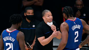 LOS ANGELES, CALIFORNIA - DECEMBER 11: Head coach Tyronn Lue of the LA Clippers speaks with Kawhi Leonard #2 and Patrick Beverley during a preseason game against the Los Angeles Lakers at Staples Center on December 11, 2020 in Los Angeles, California. (Photo by Harry How/Getty Images)