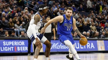 Jaden McDaniels, Luka Doncic, Minnesota Timberwolves (Photo by David Berding/Getty Images)