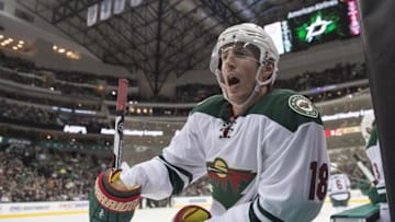 Jan 9, 2016; Dallas, TX, USA; Minnesota Wild center Ryan Carter (18) exchanges words with Dallas Stars left wing Antoine Roussel (not pictured) during the third period at American Airlines Center. Carter scores a goal. The Wild won 2-1. Mandatory Credit: Jerome Miron-USA TODAY Sports