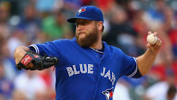 ARLINGTON, TX - AUGUST 25: Mark Buehrle #56 of the Toronto Blue Jays throws against the Texas Rangers in the first inning at Globe Life Park in Arlington on August 25, 2015 in Arlington, Texas. (Photo by Ronald Martinez/Getty Images)