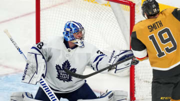 Jan 11, 2022; Las Vegas, Nevada, USA; Toronto Maple Leafs goaltender Jack Campbell (36) makes a glove save with Vegas Golden Knights right wing Reilly Smith (19) looking for a rebound during the third period at T-Mobile Arena. Mandatory Credit: Stephen R. Sylvanie-USA TODAY Sports