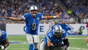 Quarterback Matthew Stafford of the Detroit Lions calls the play behind teammate center Travis Swanson during an NFL game against the Philadelphia Eagles at Ford Field on October 9, 2016 in Detroit, Michigan. (Photo by Dave Reginek/Getty Images)