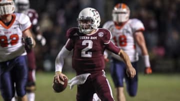 Nov 2, 2013; College Station, TX, USA; Texas A&M Aggies quarterback Johnny Manziel (2) rushes for a touchdown during the third quarter against the UTEP Miners at Kyle Field. Mandatory Credit: Troy Taormina-USA TODAY Sports