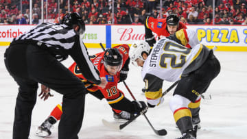 CALGARY, AB - MARCH 8: Derek Ryan #10 of the Calgary Flames faces-off against Chandler Stephenson #20 of the Vegas Golden Knights during an NHL game at Scotiabank Saddledome on March 8, 2020 in Calgary, Alberta, Canada. (Photo by Derek Leung/Getty Images)