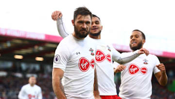 BOURNEMOUTH, ENGLAND - DECEMBER 03: Charlie Austin of Southampton celebrates after scoring his sides first goal with Sofiane Boufal of Southampton and Ryan Bertrand of Southampton during the Premier League match between AFC Bournemouth and Southampton at Vitality Stadium on December 3, 2017 in Bournemouth, England. (Photo by Clive Rose/Getty Images)