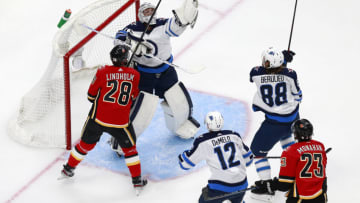 Calgary Flames and Winnipeg Jets (Photo by Jeff Vinnick/Getty Images)