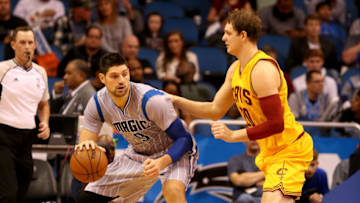ORLANDO, FL - DECEMBER 11: Nikola Vucevic #9 of the Orlando Magic is gaurded by Timofey Mozgov #20 of the Cleveland Cavaliers during the game at Amway Center on December 11, 2015 in Orlando, Florida. NOTE TO USER: User expressly acknowledges and agrees that, by downloading and/or using this Photograph, user is consenting to the terms and conditions of the Getty Images License Agreement. (Photo by Sam Greenwood/Getty Images)