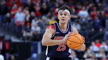 LAS VEGAS, NEVADA - MARCH 11: Kerr Kriisa #25 of the Arizona Wildcats passes against the UCLA Bruins in the first half of the championship game of the Pac-12 basketball tournament at T-Mobile Arena on March 11, 2023 in Las Vegas, Nevada. The Wildcats defeated the Bruins 61-59. (Photo by Ethan Miller/Getty Images)