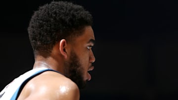 MINNEAPOLIS, MN - APRIL 11: Karl-Anthony Towns #32 of the Minnesota Timberwolves looks on during the game against the Oklahoma City Thunder on April 11, 2017 at Target Center in Minneapolis, Minnesota. NOTE TO USER: User expressly acknowledges and agrees that, by downloading and or using this Photograph, user is consenting to the terms and conditions of the Getty Images License Agreement. Mandatory Copyright Notice: Copyright 2017 NBAE (Photo by David Sherman/NBAE via Getty Images)