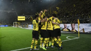 10 November 2018, North Rhine-Westphalia, Dortmund: Soccer: Bundesliga, Borussia Dortmund - Bayern Munich, 11th matchday in Signal-Iduna Park. Players from Dortmund cheer the 1:1 against Munich. Photo: Ina Fassbender/dpa - IMPORTANT NOTE: In accordance with the requirements of the DFL Deutsche Fußball Liga or the DFB Deutscher Fußball-Bund, it is prohibited to use or have used photographs taken in the stadium and/or the match in the form of sequence images and/or video-like photo sequences. (Photo by Ina Fassbender/picture alliance via Getty Images)