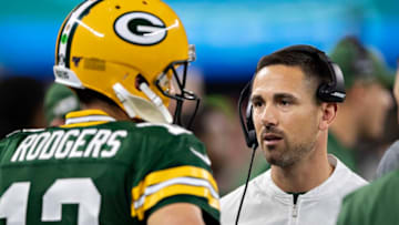 ARLINGTON, TX - OCTOBER 6: Aaron Rodgers #12 and head coach Matt LaFleur of the Green Bay Packers talk on the sidelines during a game against the Dallas Cowboys at AT&T Stadium on October 6, 2019 in Arlington, Texas. The Packers defeated the Cowboys 34-24. (Photo by Wesley Hitt/Getty Images)