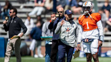 Auburn football head coach Bryan Harsin talks with Auburn Tigers quarterback T.J. Finley (1) during the A-Day spring practice at Jordan-Hare Stadium in Auburn, Ala., on Saturday, April 9, 2022.