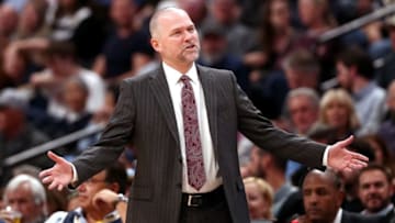 DENVER, CO - APRIL 03: Head coach Michael Malone of the Denver Nuggets reacts to a foul call as his team plays the Indiana Pacers at the Pepsi Center on April 3, 2018 in Denver, Colorado. NOTE TO USER: User expressly acknowledges and agrees that, by downloading and or using this photograph, User is consenting to the terms and conditions of the Getty Images License Agreement. (Photo by Matthew Stockman/Getty Images)