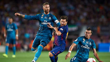 BARCELONA, SPAIN - AUGUST 13: Lionel Messi (C) of Barcelona competes for the ball with Sergio Ramos (L) and Gareth Bale (R) of Real Madrid during the Supercopa de Espana Supercopa Final 1st Leg match between FC Barcelona and Real Madrid at Camp Nou on August 13, 2017 in Barcelona, Spain. (Photo by fotopress/Getty Images)