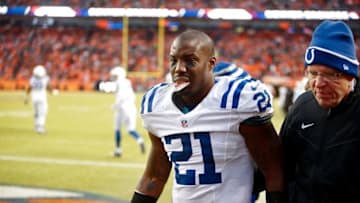 Jan 11, 2015; Denver, CO, USA; Indianapolis Colts cornerback Vontae Davis (21) walks off the field after colliding with an NFL Films videographer at the end of the second quarter in the 2014 AFC Divisional playoff football game at Sports Authority Field at Mile High. Mandatory Credit: Chris Humphreys-USA TODAY Sports