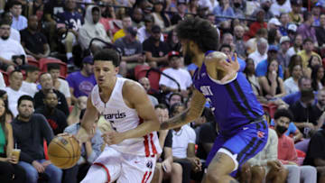 Johnny Davis #5 of the Washington Wizards drives against Isaiah Livers #12 of the Detroit Pistons (Photo by Ethan Miller/Getty Images)