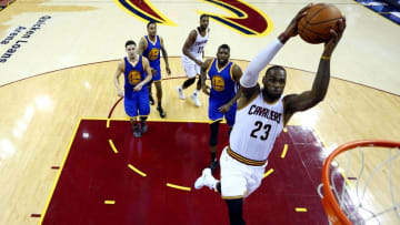 Jun 16, 2016; Cleveland, OH, USA; Cleveland Cavaliers forward LeBron James (23) dunks the ball against Golden State Warriors center Festus Ezeli (31) during the third quarter in game six of the NBA Finals at Quicken Loans Arena. Mandatory Credit: Bob Donnan-USA TODAY Sports