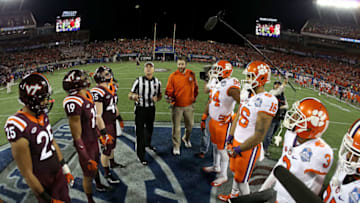 ORLANDO, FL - DECEMBER 03: The coin flip during the ACC Championship between the Clemson Tigers and the Virginia Tech Hokies on December 3, 2016 in Orlando, Florida. (Photo by Pool/Getty Images)