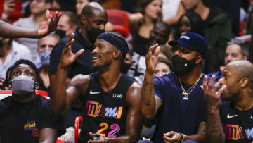 Miami Heat forward Jimmy Butler (22) celebrates from the bench with Miami Heat forward Markieff Morris (8) against the Washington Wizards(Sam Navarro-USA TODAY Sports)