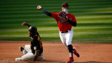CLEVELAND, OH - SEPTEMBER 27: Francisco Lindor #12 of the Cleveland Indians forces out Ke'Bryan Hayes #13 of the Pittsburgh Pirates at second base during the game at Progressive Field on September 27, 2020 in Cleveland, Ohio. (Photo by Kirk Irwin/Getty Images)