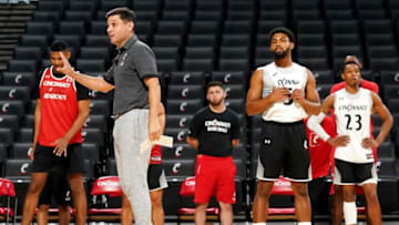 Cincinnati Bearcats head basketball coach Wes Miller runs practice at Fifth Third Arena. The Enquirer.