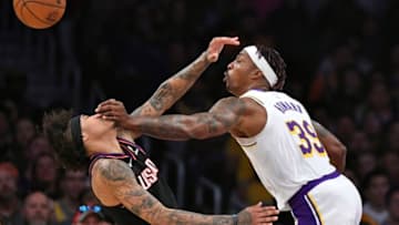 LOS ANGELES, CA - JANUARY 01: Dwight Howard #39 of the Los Angeles Lakers fouls Kelly Oubre Jr. #3 of the Phoenix Suns in the first half at Staples Center on January 1, 2020 in Los Angeles, California. NOTE TO USER: User expressly acknowledges and agrees that, by downloading and/or using this photograph, user is consenting to the terms and conditions of the Getty Images License Agreement. (Photo by John McCoy/Getty Images)