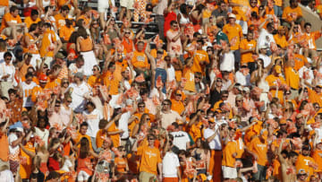 KNOXVILLE, TN - SEPTEMBER 15: Fans cheers for the Tennessee Volunteers during their game against the Florida Gators at Neyland Stadium on September 15, 2012 in Knoxville, Tennessee. (Photo by John Sommers II/Getty Images)