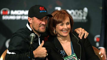 Boxer Sergey Kovalev (L) of Russia poses with Kathy Duva, CEO Main Events at a news conference at the MGM Grand in Las Vegas, November 17, 2016.Kovalev will meet Andre Ward of the US for the WBA, IBF and WBO light heavyweight world championship, November 19, 2016 at the T-Mobile Arena in Las Vegas. / AFP / John GURZINSKI (Photo credit should read JOHN GURZINSKI/AFP/Getty Images)