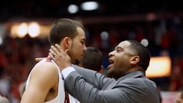 TUCSON, AZ - FEBRUARY 06: Assistant coach Book Richardson of the Arizona Wildcats talks to guard Gabe York #1 of the Wildcats during a time-out of a college basketball game against the Oregon Ducks at McKale Center on February 6, 2014 in Tucson, Arizona. (Photo by Ralph Freso/Getty Images)