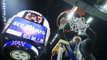 NASHVILLE, TENNESSEE - MARCH 17: Bruce Pearl of the Auburn Tigers gives cuts the net after 84-64 win over the Tennessee Volunteers during the final of the SEC Basketball Championships at Bridgestone Arena on March 17, 2019 in Nashville, Tennessee. (Photo by Andy Lyons/Getty Images)
