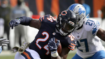 CHICAGO, IL - NOVEMBER 11: Jordan Howard #24 of the Chicago Bears carries the football against Glover Quin #27 of the Detroit Lions in the first quarter at Soldier Field on November 11, 2018 in Chicago, Illinois. (Photo by Jonathan Daniel/Getty Images)