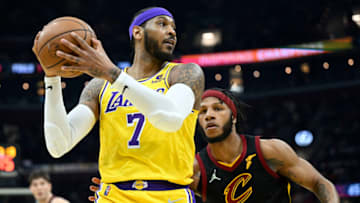 Mar 21, 2022; Cleveland, Ohio, USA; Cleveland Cavaliers forward Lamar Stevens (8) defends Los Angeles Lakers forward Carmelo Anthony (7) in the second quarter at Rocket Mortgage FieldHouse. Mandatory Credit: David Richard-USA TODAY Sports