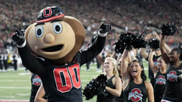 Sep 24, 2022; Columbus, Ohio, USA; Brutus Buckeye and the Ohio State Buckeyes cheerleaders cheer before the start of their NCAA football game between Ohio State Buckeyes and Wisconsin Badgers at Ohio Stadium.Osu22wis Kwr 48