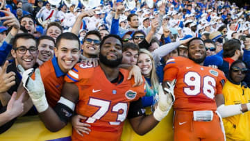 Nov 19, 2016; Baton Rouge, LA, USA; Florida Gators offensive lineman Martez Ivey (73) and defensive lineman Cece Jefferson (96) celebrate the win over the LSU Tigers at Tiger Stadium. The Gators defeat the Tigers 16-10. Mandatory Credit: Jerome Miron-USA TODAY Sports