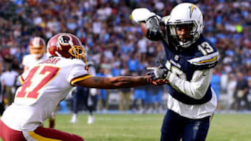 CARSON, CA - DECEMBER 10: Keenan Allen #13 of the Los Angeles Chargers cuts back away from Quinton Dunbar #47 of the Washington Redskins after his catch for a first down during the first quarter at StubHub Center on December 10, 2017 in Carson, California. (Photo by Harry How/Getty Images)